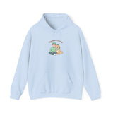Light blue hoodie with a graphic of a person and a dog on a white background