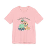 Pink t-shirt with a graphic of a person and dog sitting together and 'Together Forever' text on a white background.