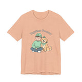 Peach t-shirt with a graphic of a person and dog sitting together with 'Together Forever' text on a white background.