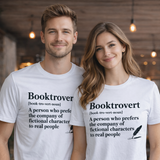 Two people wearing white t-shirts with 'Booktrovert' definitions and definitions of 'booktrover'.
