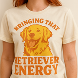 Person wearing a t-shirt with a dog graphic and text on a beige background